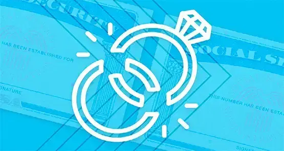 image of a broken diamond ring on top of a blue social security card