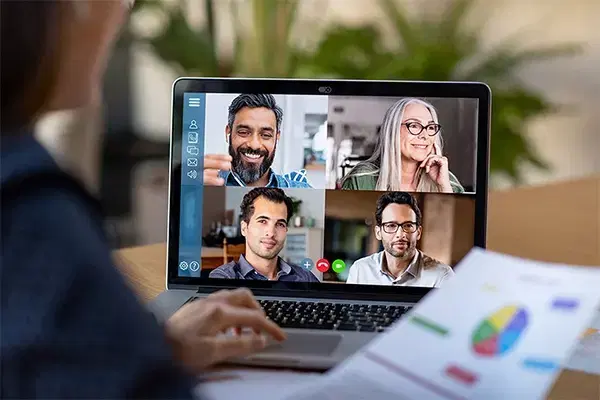 People in an office smiling