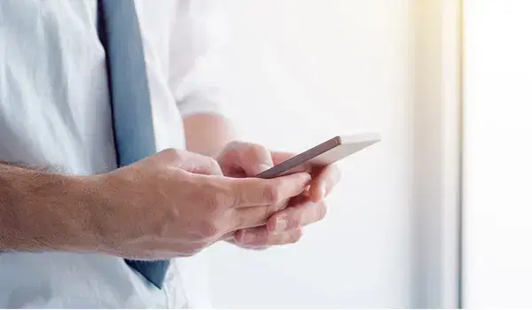 picture of hands using a mobile phone