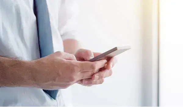 picture of hands using a mobile phone