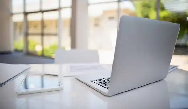 picture of laptop computer in modern office