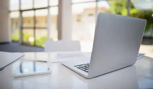 picture of laptop computer in modern office