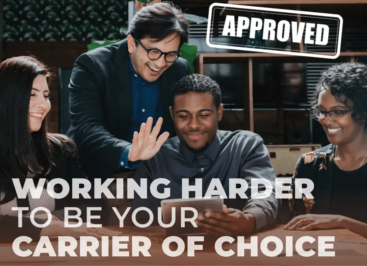 People in an office smiling